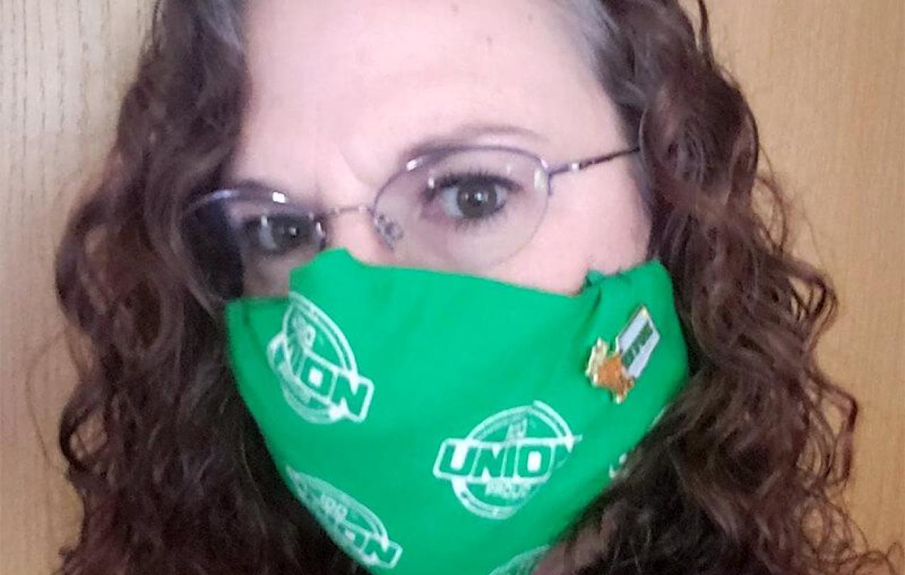 Woman wearing Union decorated mask