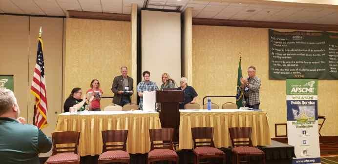 Jordan Harrington speaks at a podium after winning the Rising Star Award.