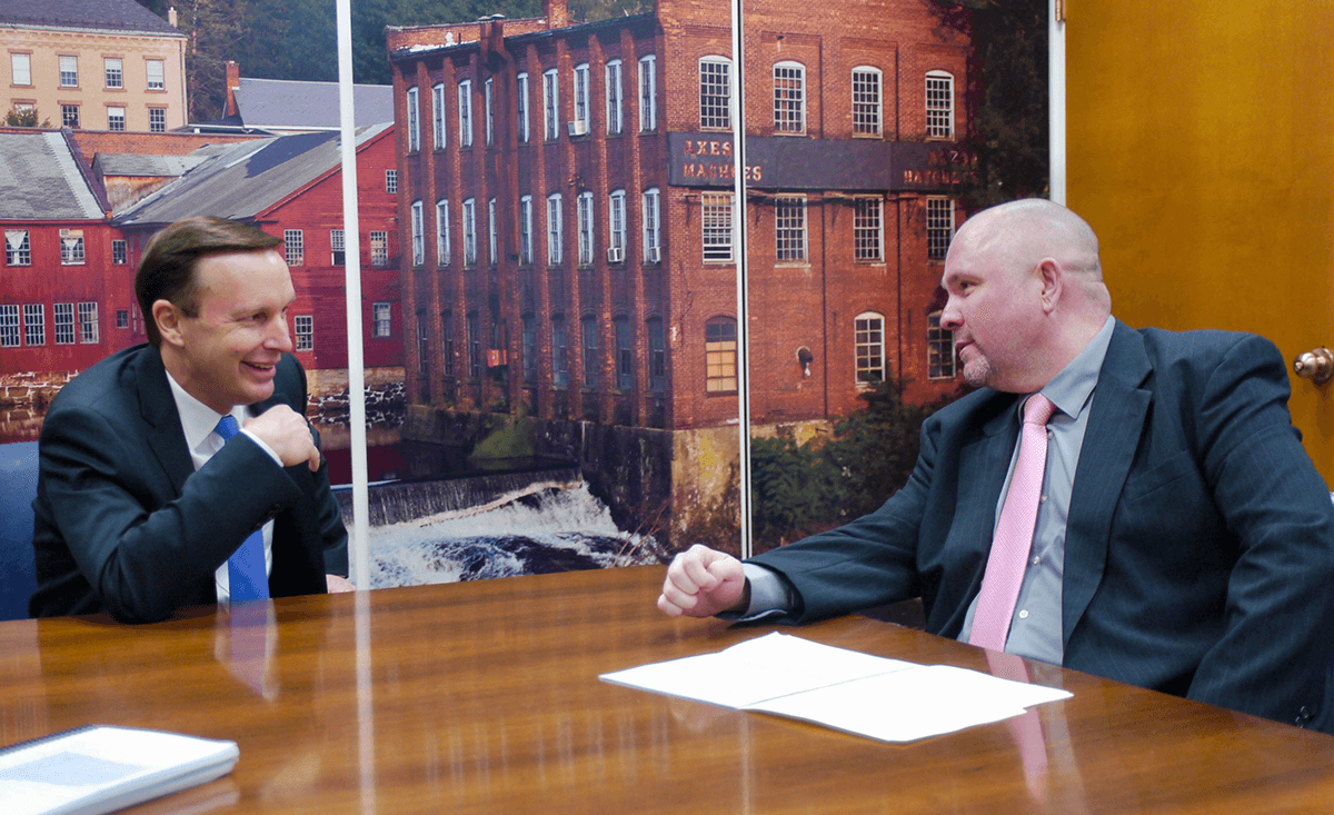 AFSCME member Shawn Dougherty talks to Sen. Chris Murphy of Connecticut