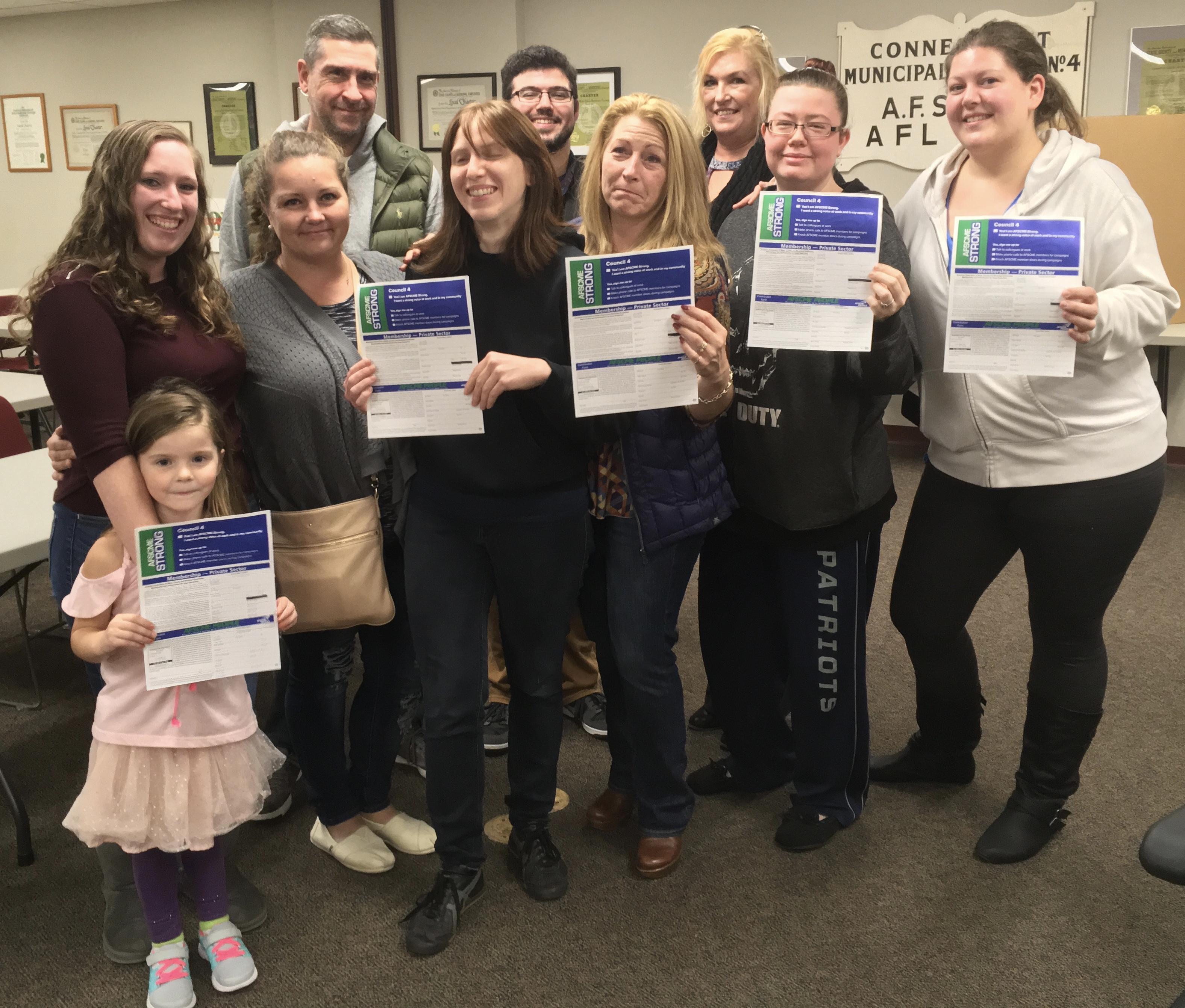 AFSCME Local 3145 members (American Red Cross) with their AFSCME Strong cards.