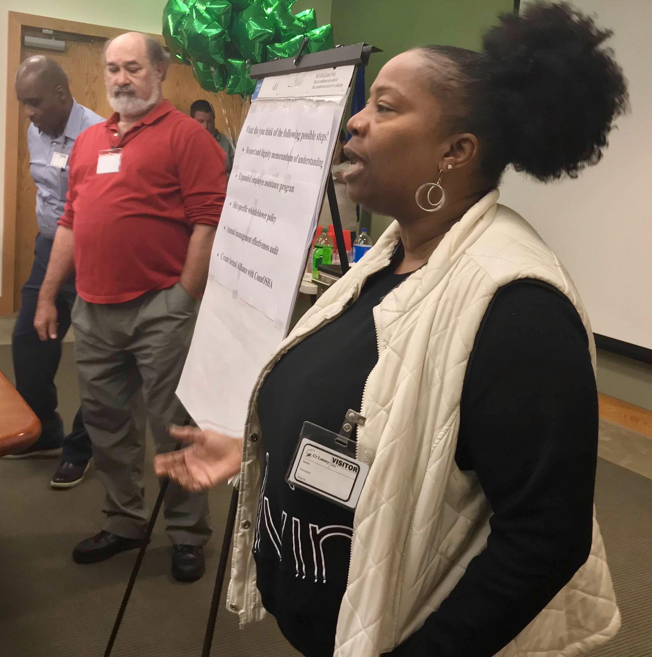 Local 318 President speaks with CT Lottery members at a recent meeting. Also pictured, from left, are CEUI President Carl Chisem and CEUI Rep Steve Schrag.