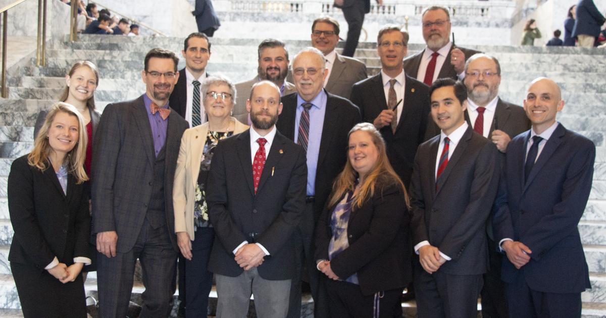 Group of Assistant Attorneys General and WFSE staff at WA State Capitol building