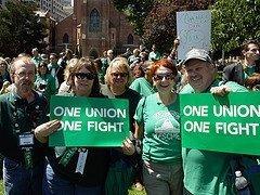 Group of WFSE members hold signs