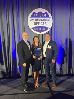 Det. Karli Travis (center) being inducted into the National Law Enforcement Hall of Fame. Photo courtesy of Karli Travis.